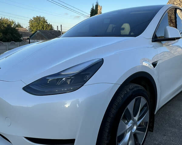 Білий Тесла Model Y, об'ємом двигуна 0 л та пробігом 81 тис. км за 31900 $, фото 9 на Automoto.ua