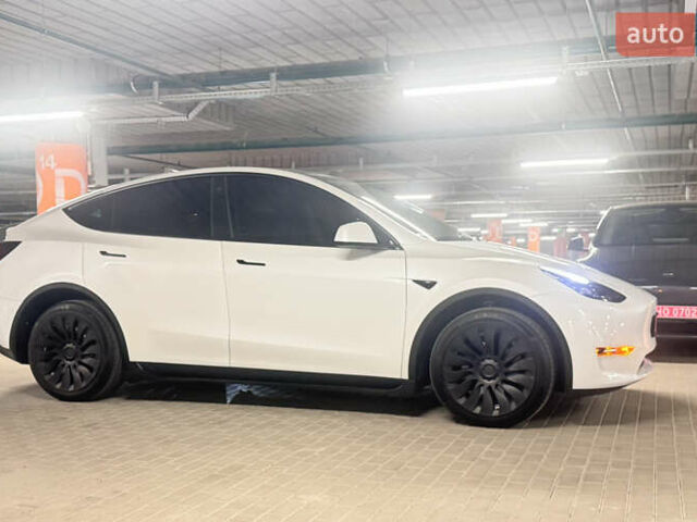 Белый Тесла Model Y, объемом двигателя 0 л и пробегом 87 тыс. км за 28999 $, фото 7 на Automoto.ua