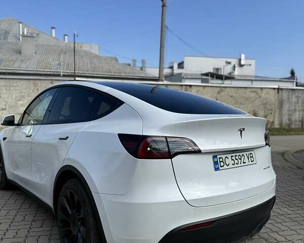 Білий Тесла Model Y, об'ємом двигуна 0 л та пробігом 32 тис. км за 27200 $, фото 23 на Automoto.ua