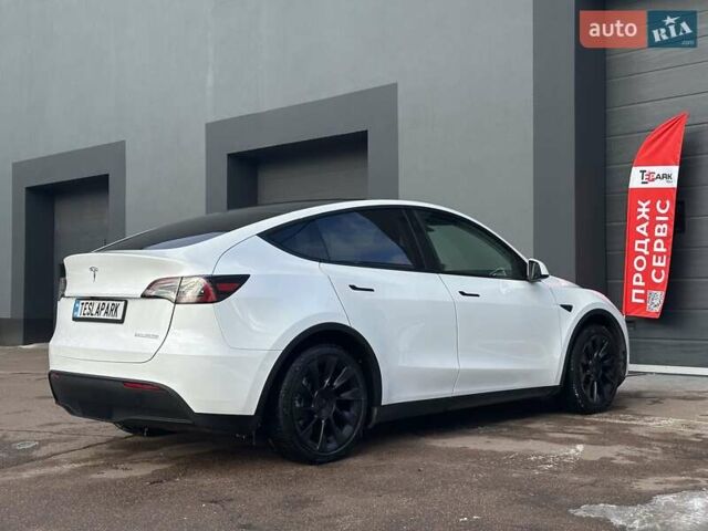 Білий Тесла Model Y, об'ємом двигуна 0 л та пробігом 36 тис. км за 30999 $, фото 8 на Automoto.ua