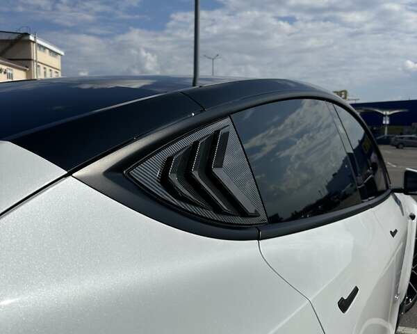 Білий Тесла Model Y, об'ємом двигуна 0 л та пробігом 75 тис. км за 33500 $, фото 7 на Automoto.ua