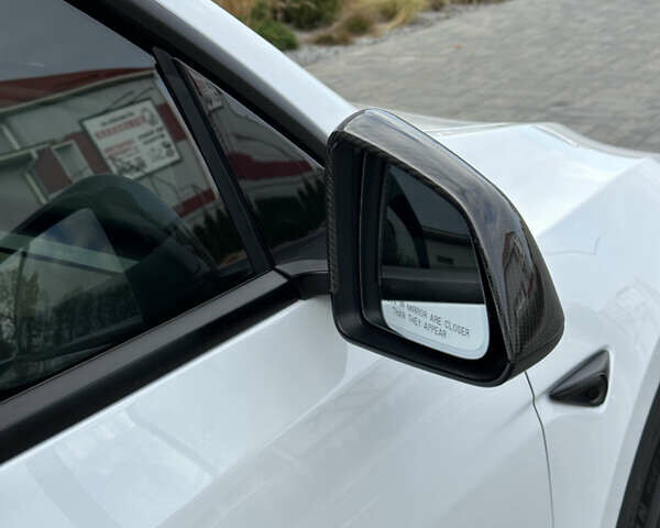 Белый Тесла Model Y, объемом двигателя 0 л и пробегом 24 тыс. км за 32000 $, фото 23 на Automoto.ua