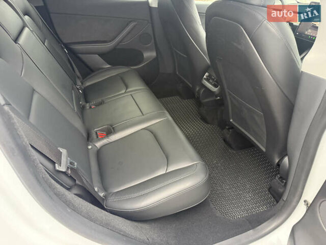 Белый Тесла Model Y, объемом двигателя 0 л и пробегом 53 тыс. км за 28800 $, фото 19 на Automoto.ua