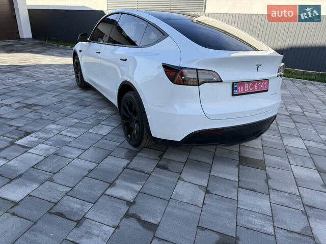 Білий Тесла Model Y, об'ємом двигуна 0 л та пробігом 49 тис. км за 24900 $, фото 2 на Automoto.ua