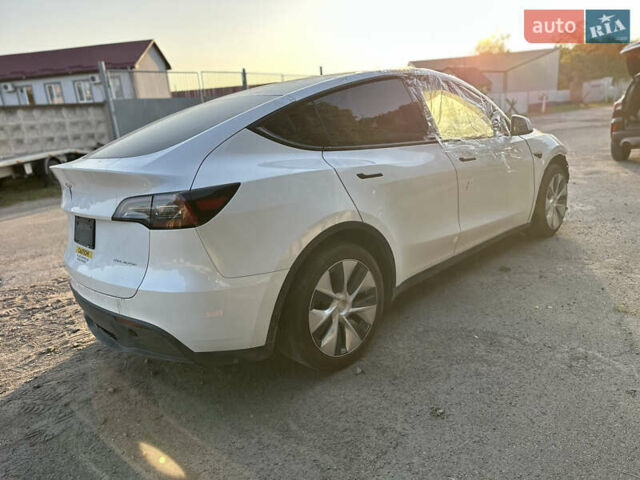 Тесла Model Y 2023 в Ровно на Automoto.ua Белый Тесла Model Y, объемом двигателя 0 л и пробегом 98 тыс. км за 17400 $, фото 6 на Automoto.ua