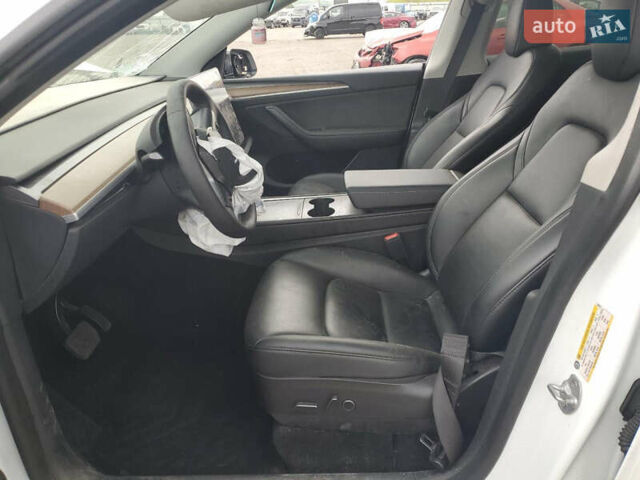 Белый Тесла Model Y, объемом двигателя 0 л и пробегом 62 тыс. км за 21750 $, фото 7 на Automoto.ua