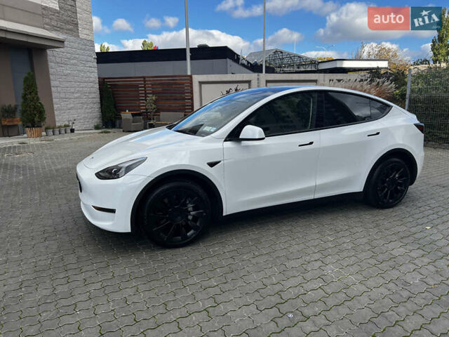 Белый Тесла Model Y, объемом двигателя 0 л и пробегом 98 тыс. км за 28000 $, фото 2 на Automoto.ua