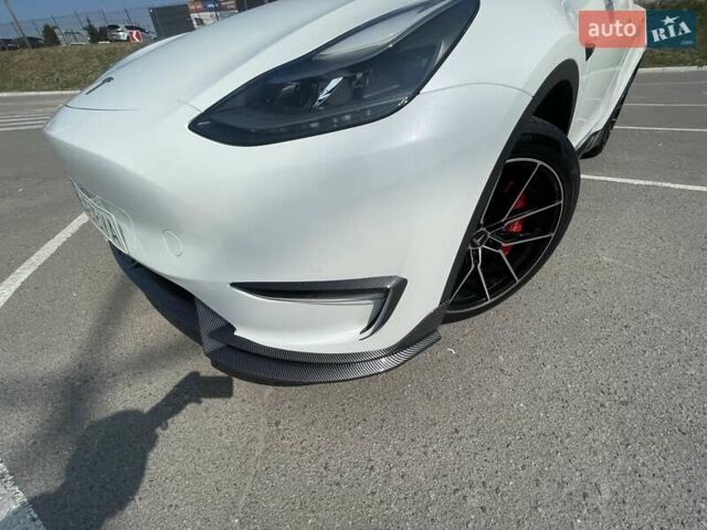 Білий Тесла Model Y, об'ємом двигуна 0 л та пробігом 75 тис. км за 33500 $, фото 2 на Automoto.ua