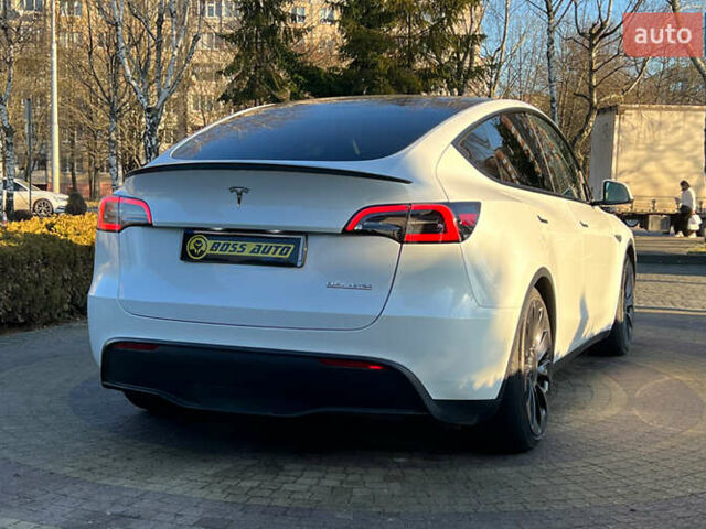 Білий Тесла Model Y, об'ємом двигуна 0 л та пробігом 73 тис. км за 27750 $, фото 6 на Automoto.ua