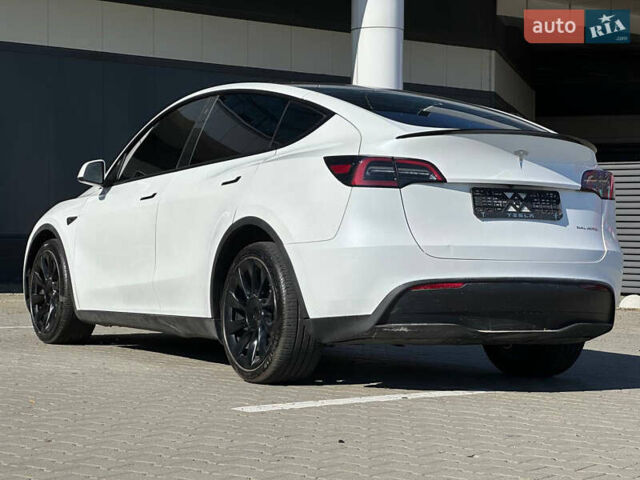 Білий Тесла Model Y, об'ємом двигуна 0 л та пробігом 53 тис. км за 25900 $, фото 10 на Automoto.ua
