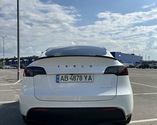 Білий Тесла Model Y, об'ємом двигуна 0 л та пробігом 75 тис. км за 33500 $, фото 4 на Automoto.ua