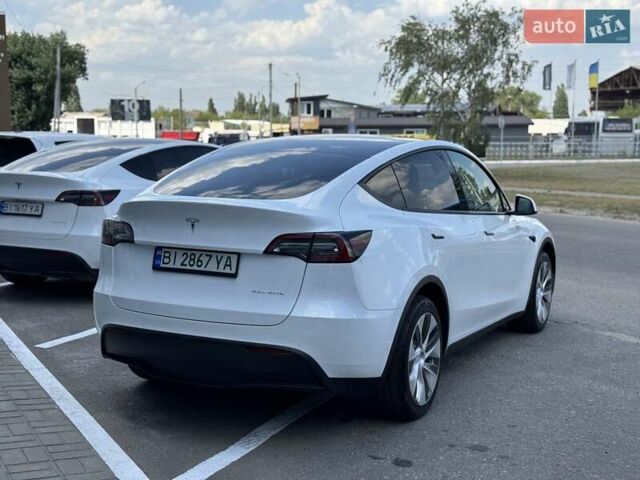 Белый Тесла Model Y, объемом двигателя 0 л и пробегом 6 тыс. км за 38000 $, фото 4 на Automoto.ua