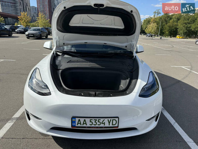 Тесла Model Y 2023 в Киеве на Automoto.ua Белый Тесла Model Y, объемом двигателя 0 л и пробегом 70 тыс. км за 31000 $, фото 25 на Automoto.ua