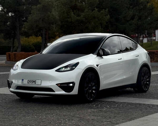 Білий Тесла Model Y, об'ємом двигуна 0 л та пробігом 52 тис. км за 32000 $, фото 7 на Automoto.ua