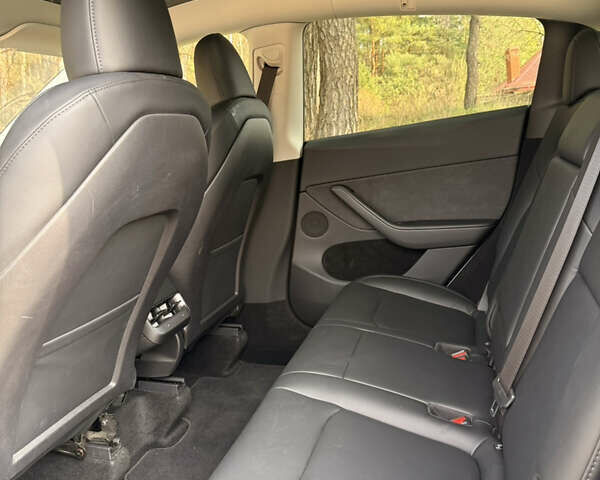 Белый Тесла Model Y, объемом двигателя 0 л и пробегом 80 тыс. км за 34800 $, фото 12 на Automoto.ua