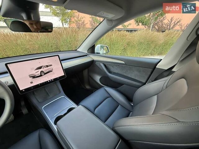 Белый Тесла Model Y, объемом двигателя 0 л и пробегом 35 тыс. км за 34500 $, фото 32 на Automoto.ua