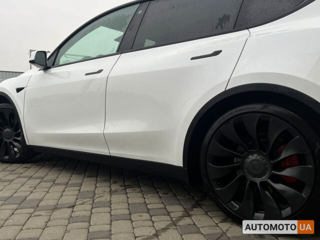 Білий Тесла Model Y, об'ємом двигуна 82 л та пробігом 33 тис. км за 35000 $, фото 11 на Automoto.ua