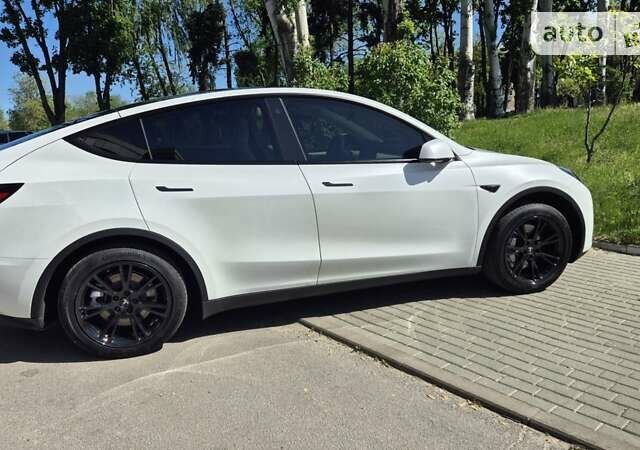 Білий Тесла Model Y, об'ємом двигуна 0 л та пробігом 11 тис. км за 35000 $, фото 8 на Automoto.ua