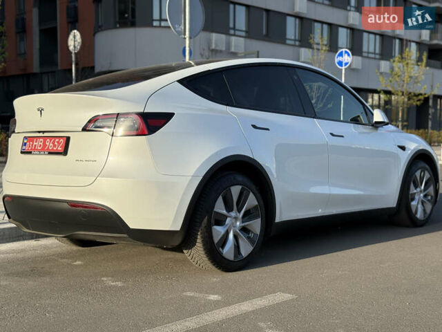 Білий Тесла Model Y, об'ємом двигуна 0 л та пробігом 55 тис. км за 33014 $, фото 14 на Automoto.ua