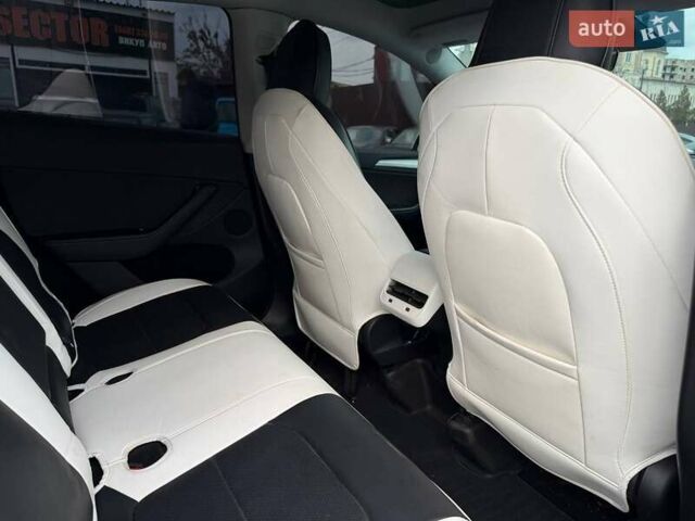 Белый Тесла Model Y, объемом двигателя 0 л и пробегом 53 тыс. км за 28800 $, фото 19 на Automoto.ua