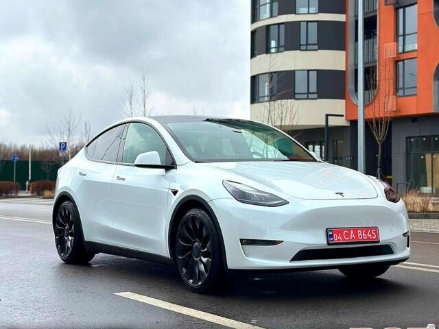 Белый Тесла Model Y, объемом двигателя 0 л и пробегом 33 тыс. км за 28700 $, фото 1 на Automoto.ua