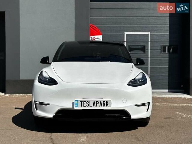 Білий Тесла Model Y, об'ємом двигуна 0 л та пробігом 42 тис. км за 31500 $, фото 1 на Automoto.ua