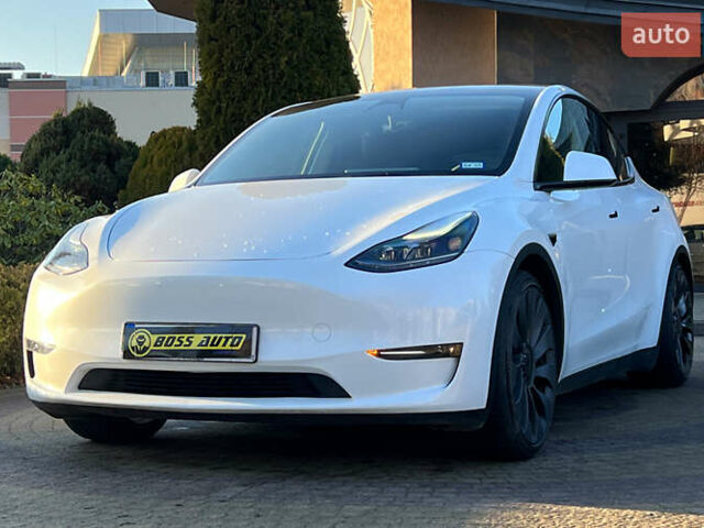 Білий Тесла Model Y, об'ємом двигуна 0 л та пробігом 73 тис. км за 27750 $, фото 2 на Automoto.ua