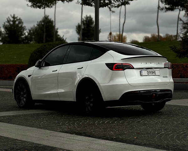 Білий Тесла Model Y, об'ємом двигуна 0 л та пробігом 52 тис. км за 32000 $, фото 8 на Automoto.ua