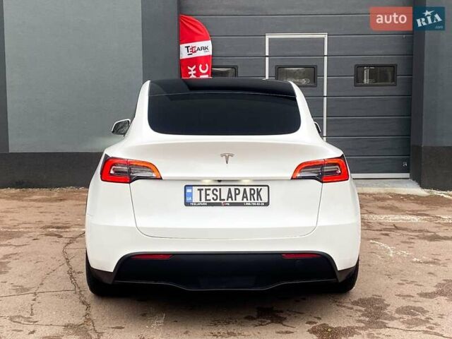 Белый Тесла Model Y, объемом двигателя 0 л и пробегом 49 тыс. км за 34999 $, фото 8 на Automoto.ua