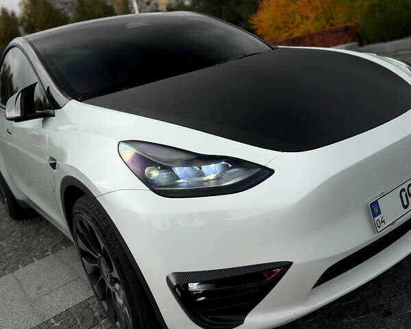Білий Тесла Model Y, об'ємом двигуна 0 л та пробігом 52 тис. км за 32000 $, фото 14 на Automoto.ua