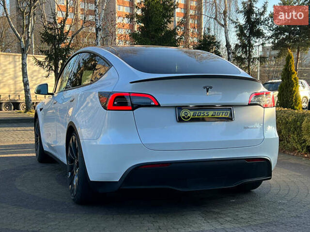 Білий Тесла Model Y, об'ємом двигуна 0 л та пробігом 73 тис. км за 27750 $, фото 4 на Automoto.ua