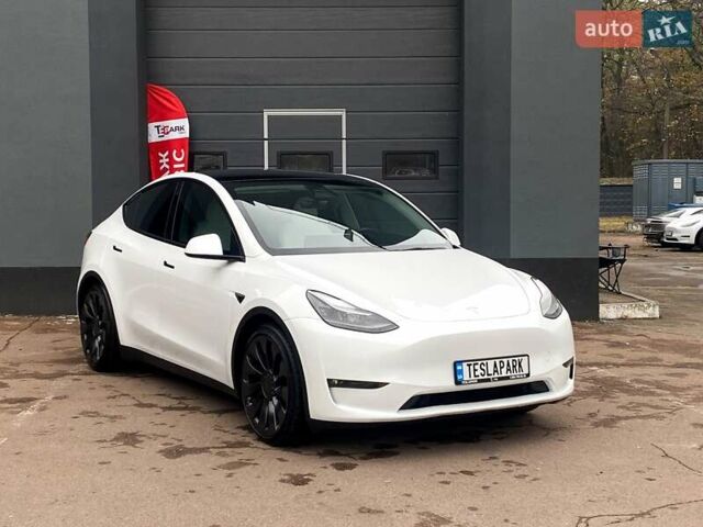 Белый Тесла Model Y, объемом двигателя 0 л и пробегом 49 тыс. км за 34999 $, фото 11 на Automoto.ua