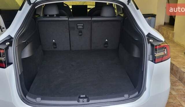 Белый Тесла Model Y, объемом двигателя 0 л и пробегом 56 тыс. км за 26500 $, фото 22 на Automoto.ua