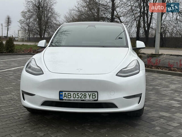 Белый Тесла Model Y, объемом двигателя 0 л и пробегом 53 тыс. км за 28800 $, фото 2 на Automoto.ua