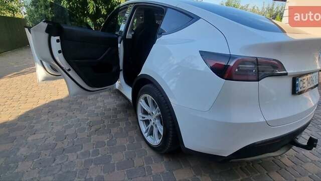 Белый Тесла Model Y, объемом двигателя 0 л и пробегом 13 тыс. км за 29500 $, фото 25 на Automoto.ua