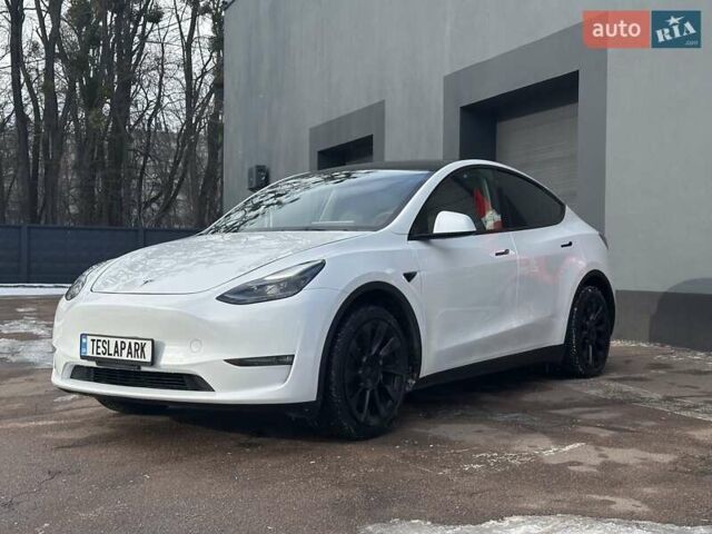 Білий Тесла Model Y, об'ємом двигуна 0 л та пробігом 36 тис. км за 30999 $, фото 2 на Automoto.ua