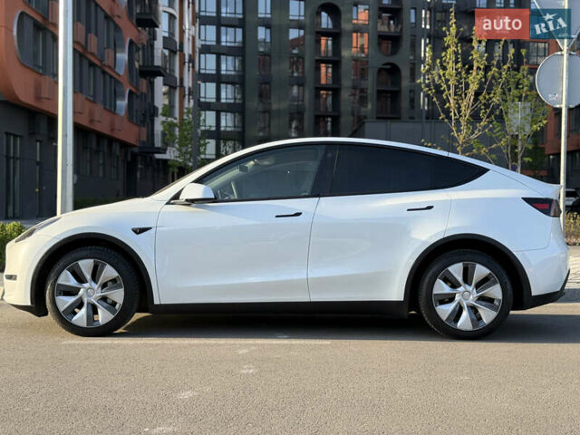 Білий Тесла Model Y, об'ємом двигуна 0 л та пробігом 55 тис. км за 33014 $, фото 7 на Automoto.ua