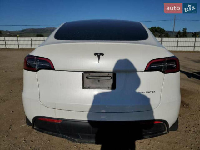 Белый Тесла Model Y, объемом двигателя 0 л и пробегом 52 тыс. км за 19800 $, фото 5 на Automoto.ua