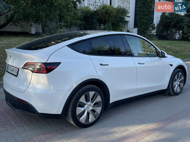 Белый Тесла Model Y, объемом двигателя 0 л и пробегом 81 тыс. км за 24700 $, фото 7 на Automoto.ua
