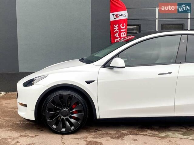 Белый Тесла Model Y, объемом двигателя 0 л и пробегом 49 тыс. км за 34999 $, фото 4 на Automoto.ua