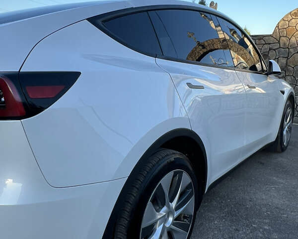 Білий Тесла Model Y, об'ємом двигуна 0 л та пробігом 81 тис. км за 31900 $, фото 12 на Automoto.ua