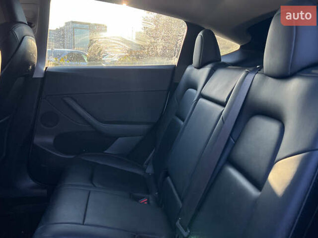 Білий Тесла Model Y, об'ємом двигуна 0 л та пробігом 73 тис. км за 27750 $, фото 19 на Automoto.ua