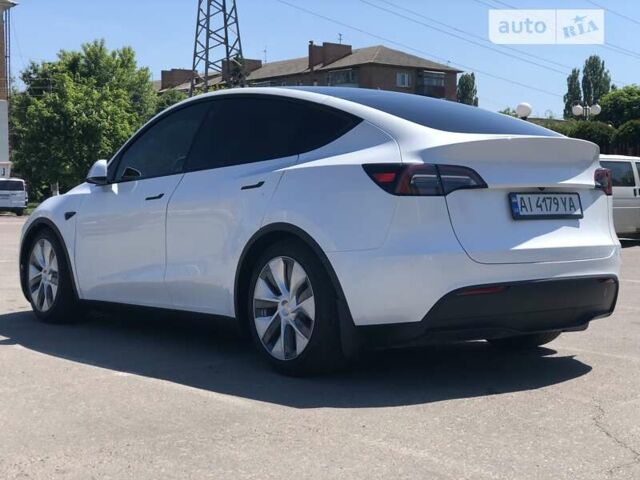 Білий Тесла Model Y, об'ємом двигуна 0 л та пробігом 7 тис. км за 35900 $, фото 2 на Automoto.ua