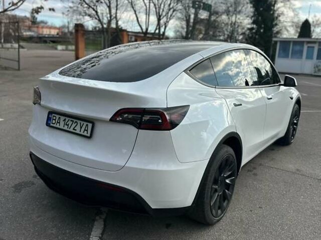 Білий Тесла Model Y, об'ємом двигуна 0 л та пробігом 49 тис. км за 27500 $, фото 4 на Automoto.ua