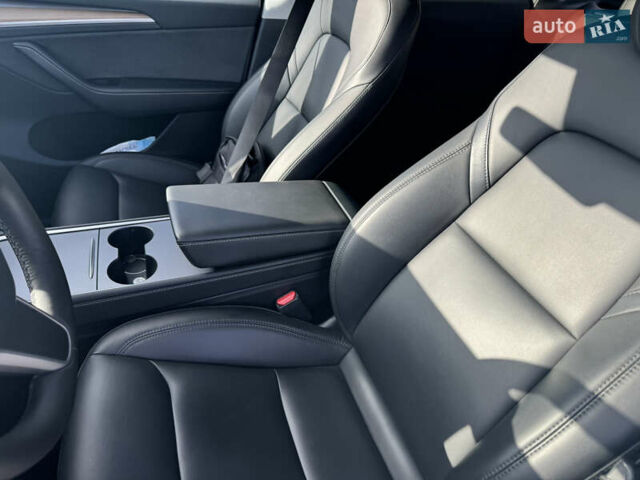 Белый Тесла Model Y, объемом двигателя 0 л и пробегом 76 тыс. км за 33000 $, фото 17 на Automoto.ua