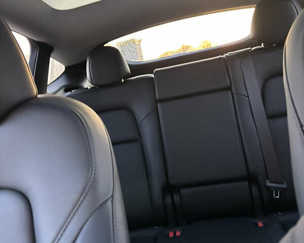 Белый Тесла Model Y, объемом двигателя 0 л и пробегом 45 тыс. км за 26999 $, фото 24 на Automoto.ua