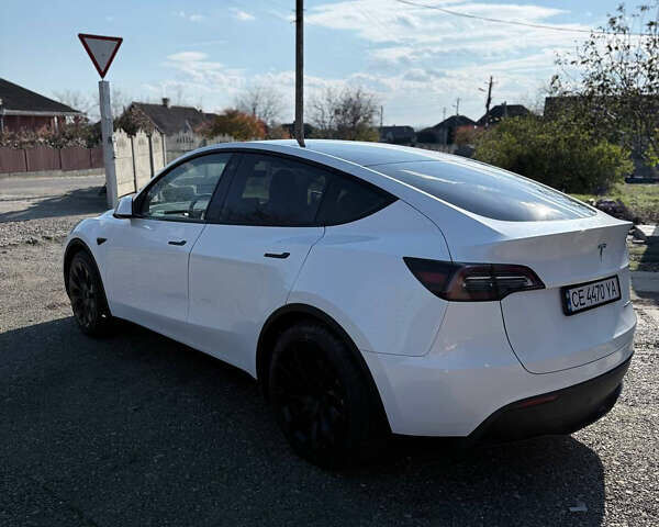 Білий Тесла Model Y, об'ємом двигуна 0 л та пробігом 23 тис. км за 28500 $, фото 4 на Automoto.ua