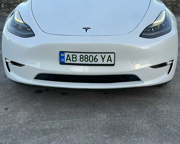 Білий Тесла Model Y, об'ємом двигуна 0 л та пробігом 81 тис. км за 31900 $, фото 42 на Automoto.ua