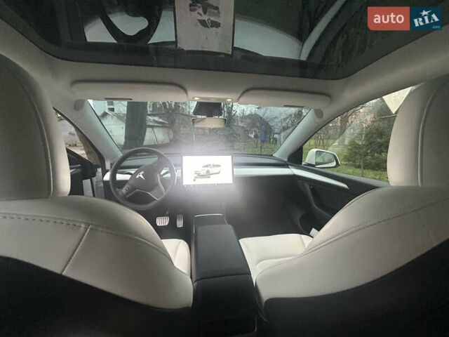 Білий Тесла Model Y, об'ємом двигуна 0 л та пробігом 84 тис. км за 28300 $, фото 10 на Automoto.ua