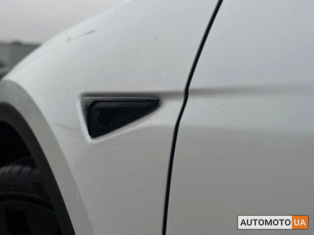 Білий Тесла Model Y, об'ємом двигуна 82 л та пробігом 33 тис. км за 35000 $, фото 10 на Automoto.ua